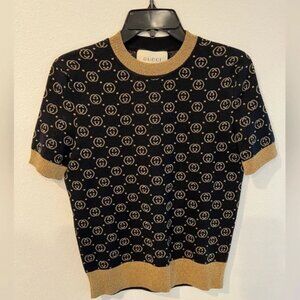 Gold lame Gucci top.